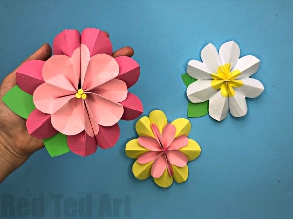 three beautiful colorful paper 3d flowers