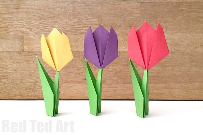 three paper flower tulips standing 