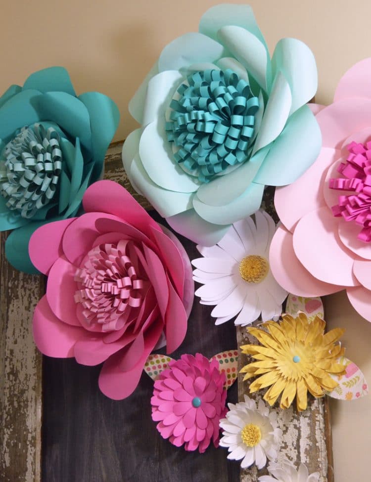 Multiple pink and blue paper flowers