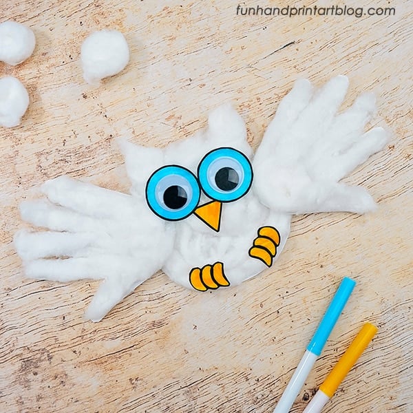 handprint snowy owl with pens