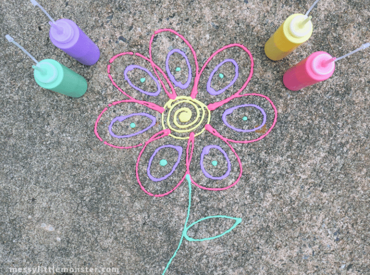 outdoor puffy paint with painted flower on sidewalk