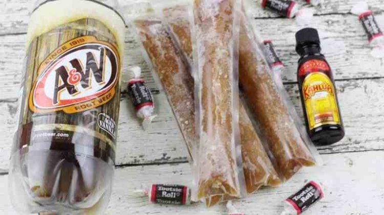 boozy tootsie roll frozen popsicles with rootbeer and tootsie rolls