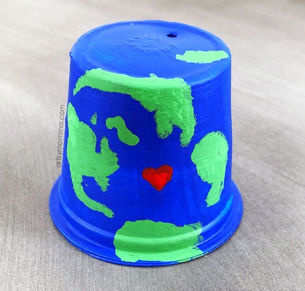 earth day painted bucket with a heart