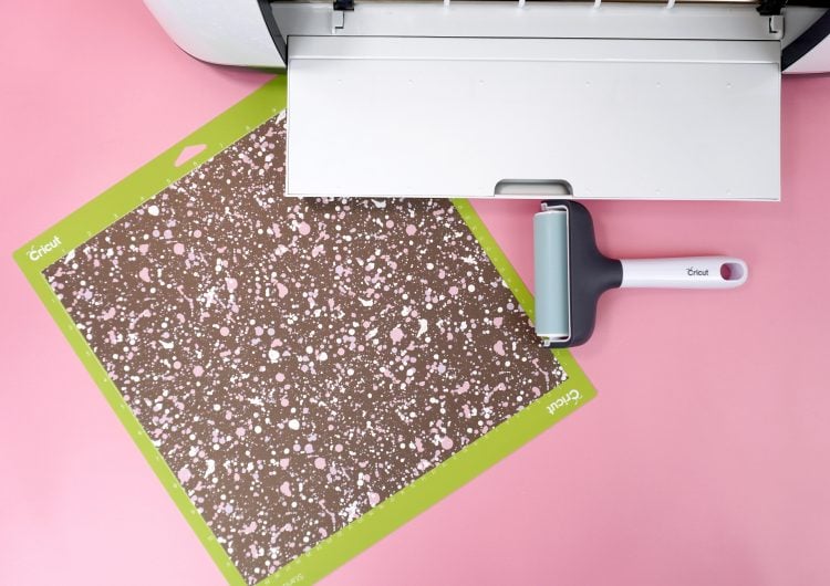 Pink and Black "Paint Drips" Infusible Ink on Cricut Cutting mat with Cricut Maker and brayer