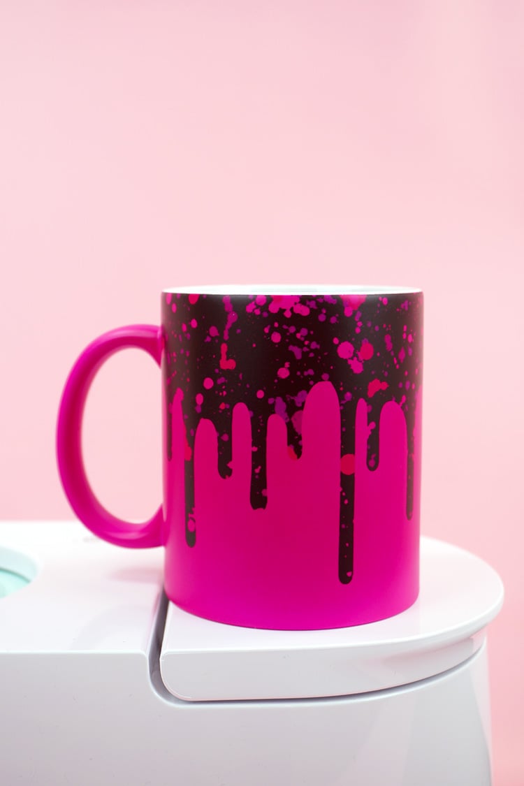 Hot pink and black "drippy" Infusible Ink design with Cricut Mug Press