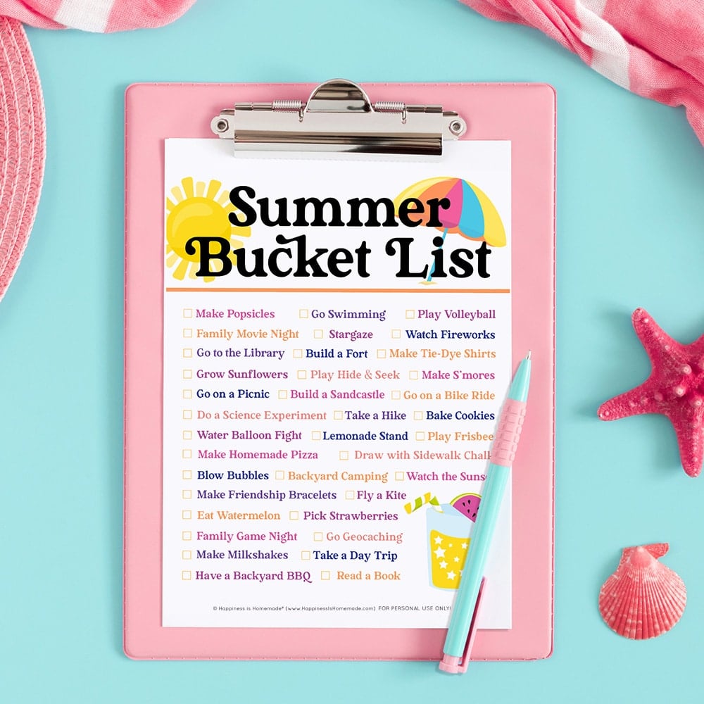 Summer bucket list printable on pink clipboard and aqua background