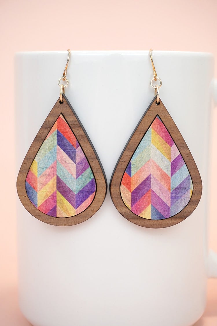 teardrop laser cut wood earrings with colorful herringbone patterned cork inlay