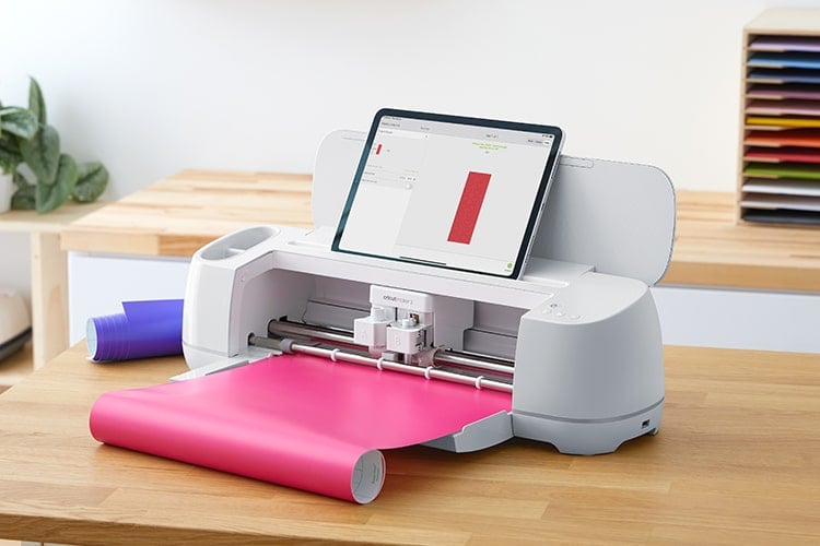 tablet on top of cricut maker 3 machine