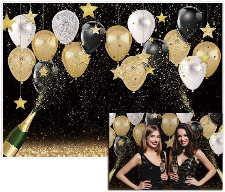 Party themed backdrop with gold black and silver balloons