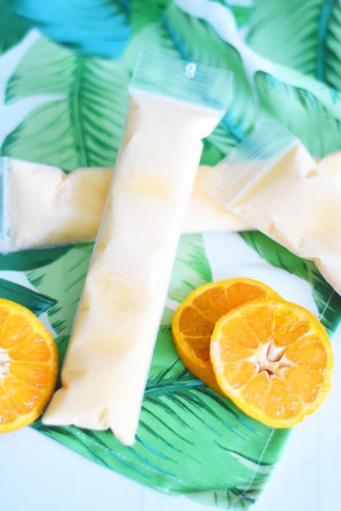 orange dreamsicle alcoholic popsicles with oranges
