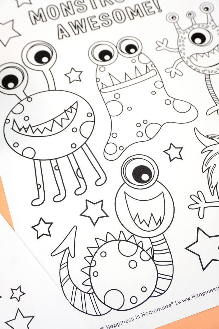 Close up detail of one-eyed smiling monster on monster coloring sheet