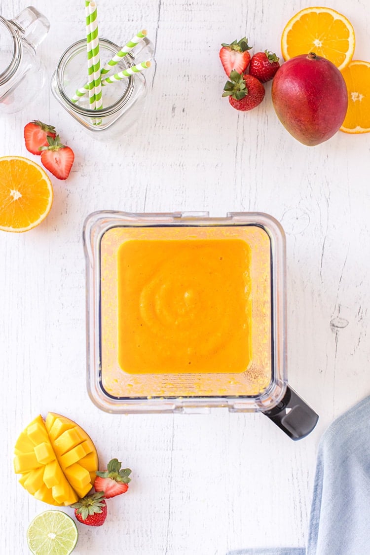 Overhead shot of Blended Mango Smoothie in a Blender