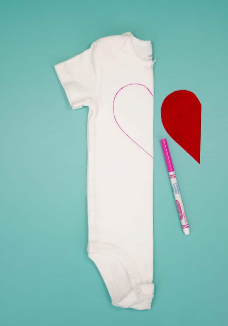 heart traced onto folded shirt with pen