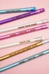 Close up of colorful Glowforge engraved personalized pencils with punny phrases like "Write on"