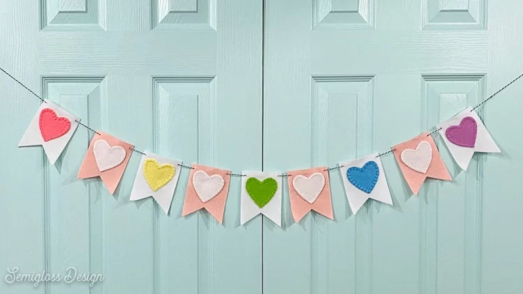 diy heart banner hung on door