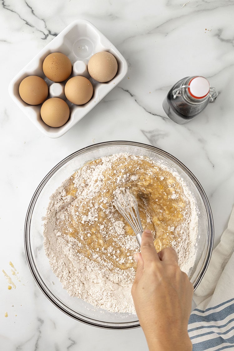 mixing up the donut batter for donut recipe