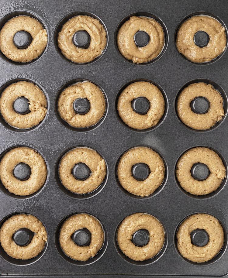 donut baking tray filled and ready to be cooked 