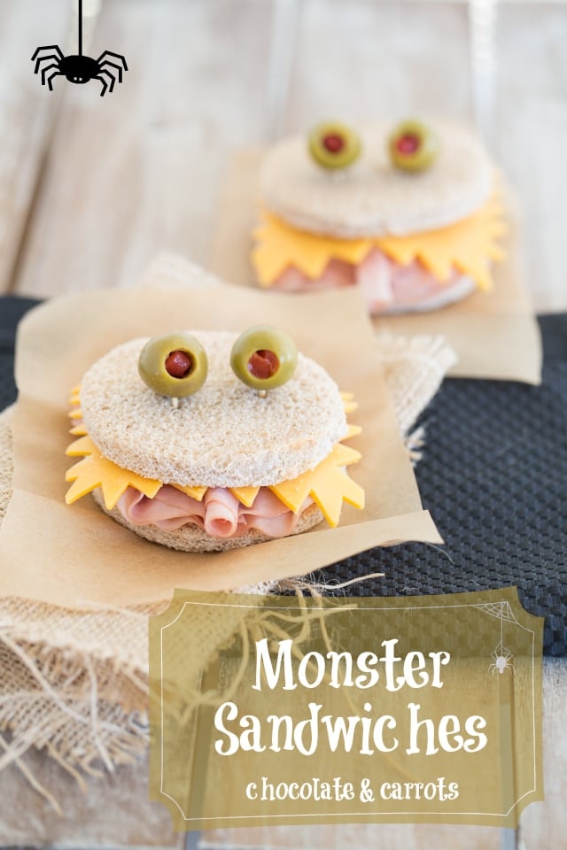 Round ham and cheese sandwiches for kids dressed up to look like monsters with olive and pimento eyes