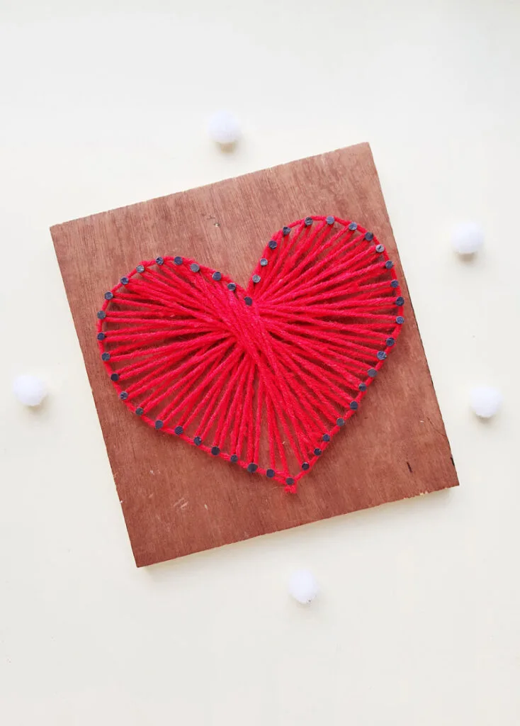 heart design made using string art