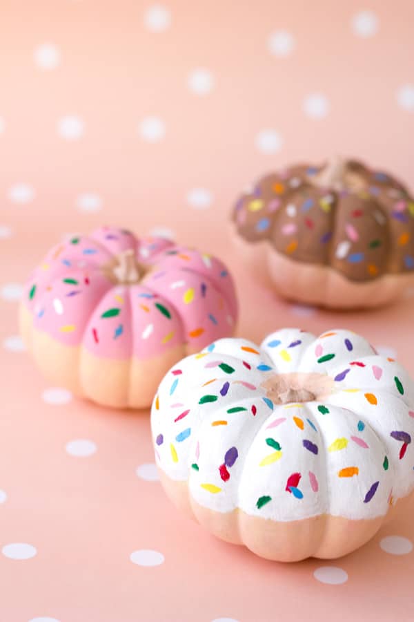 pumpkins painted to look like donuts