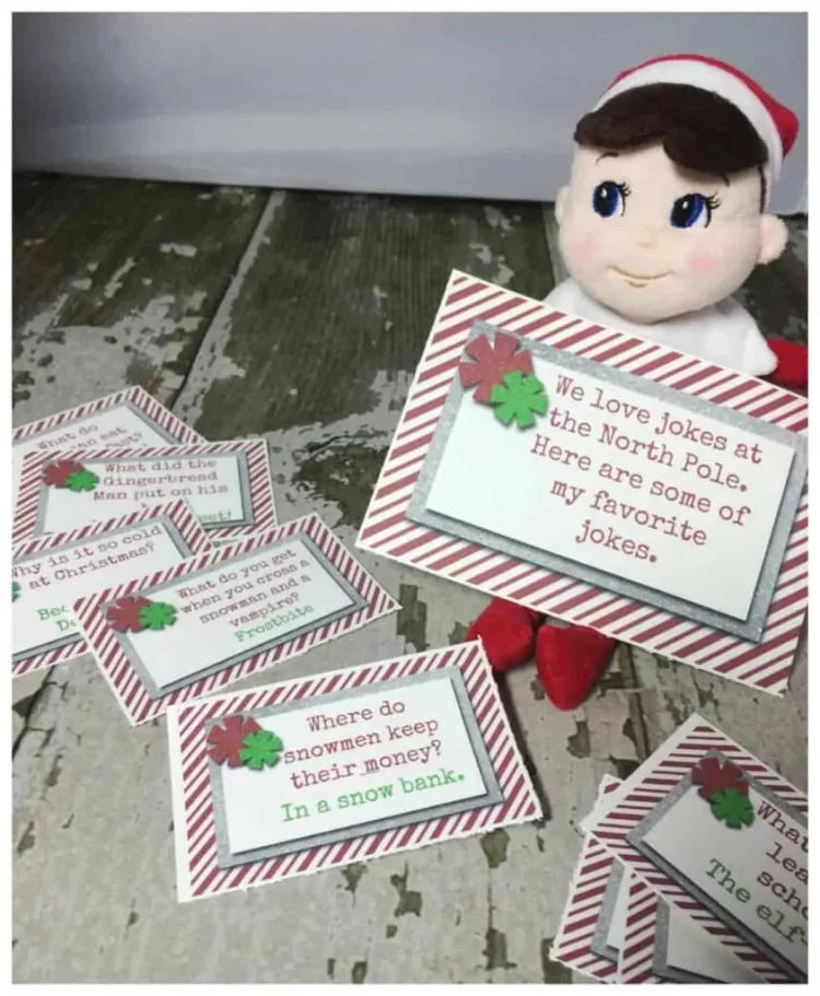 Printable elf jokes on red striped back ground with elf on the shelf doll