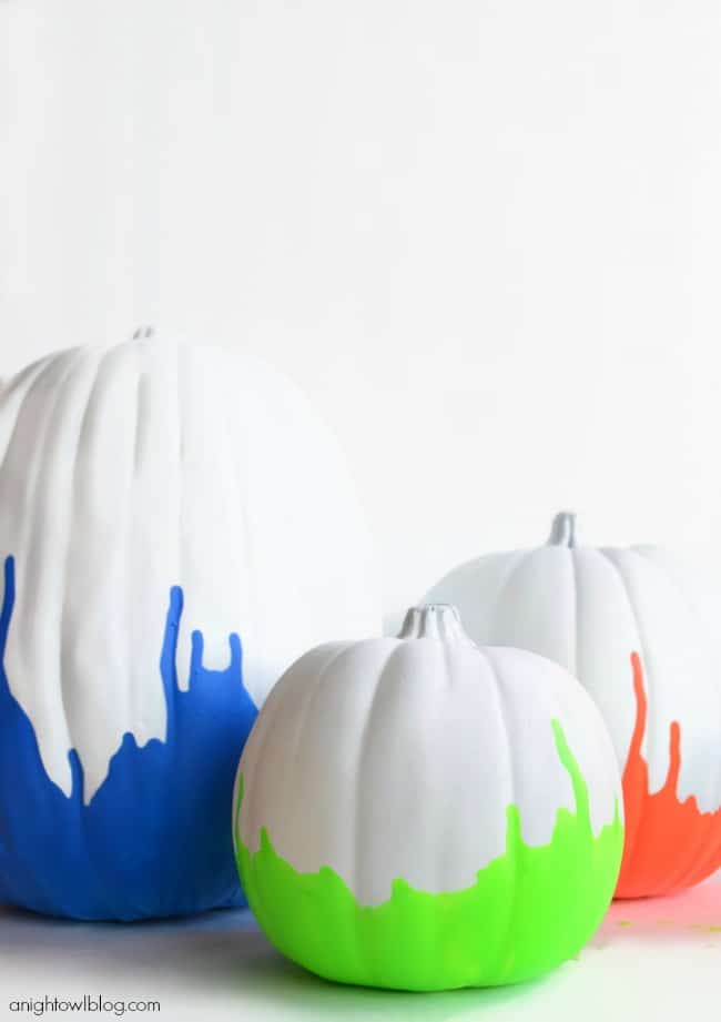 neon paint dipped white pumpkins 