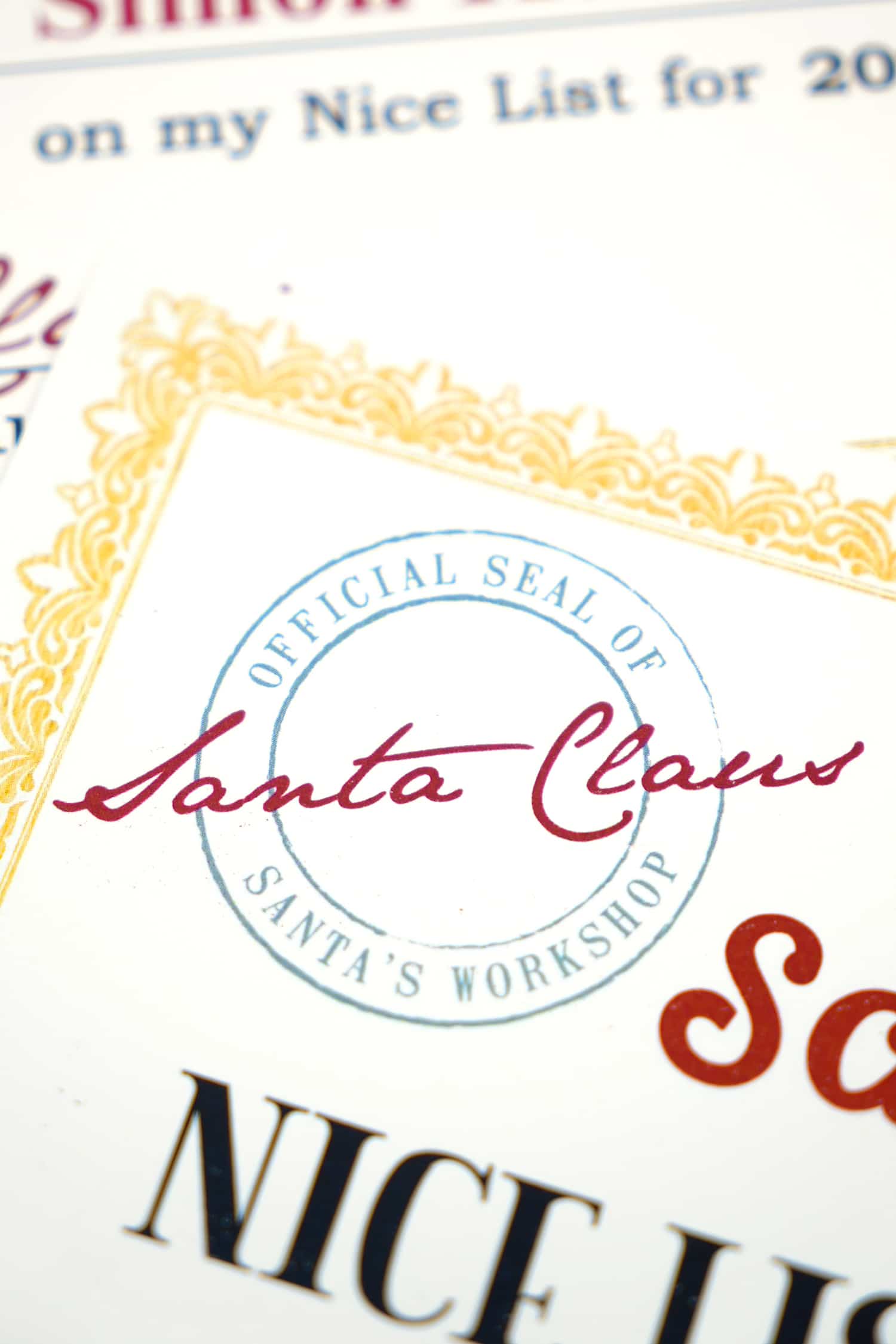 Close up of "Official Seal of Santa's Workshop" symbol on free printable Santa's Nice List certificate