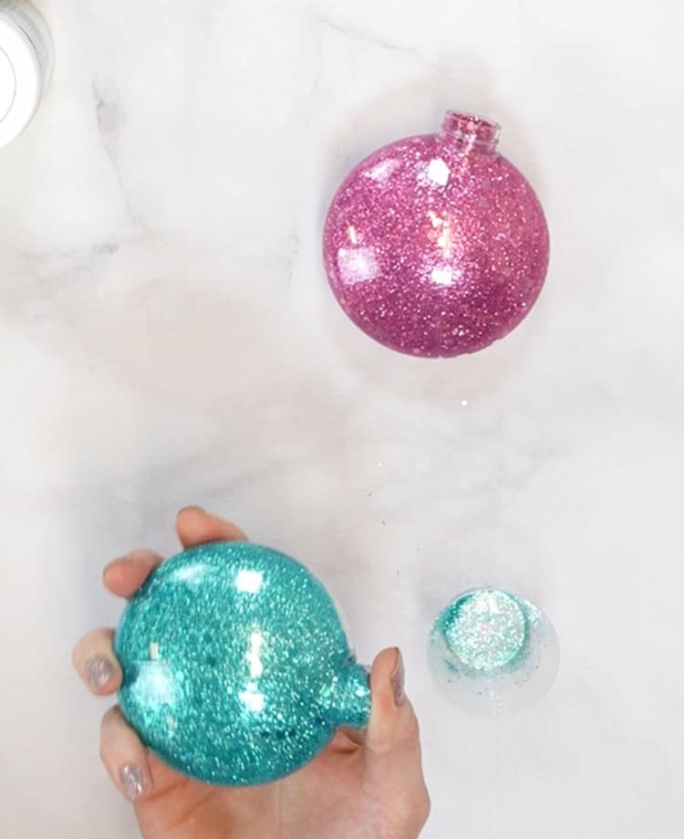 shaking up the glitter inside of the ornaments