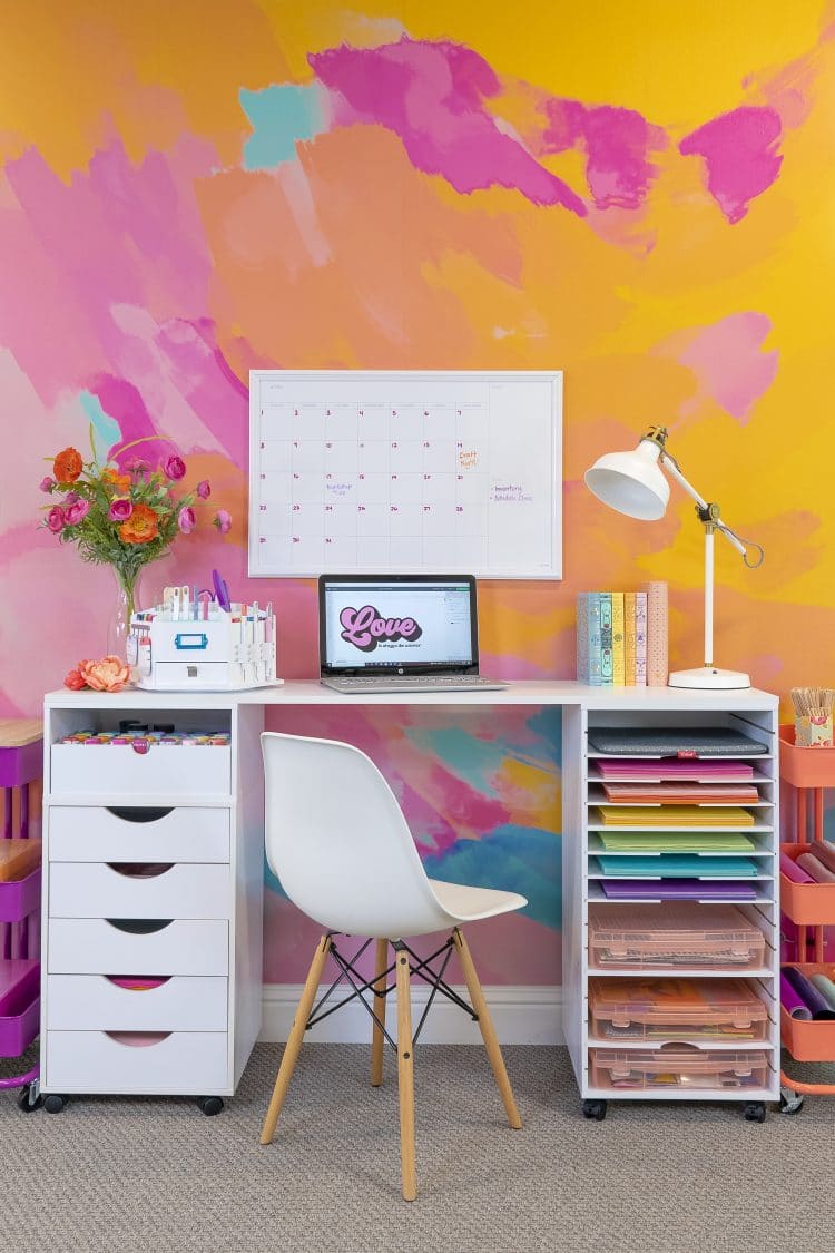 office desk space with cricut design space open on laptop