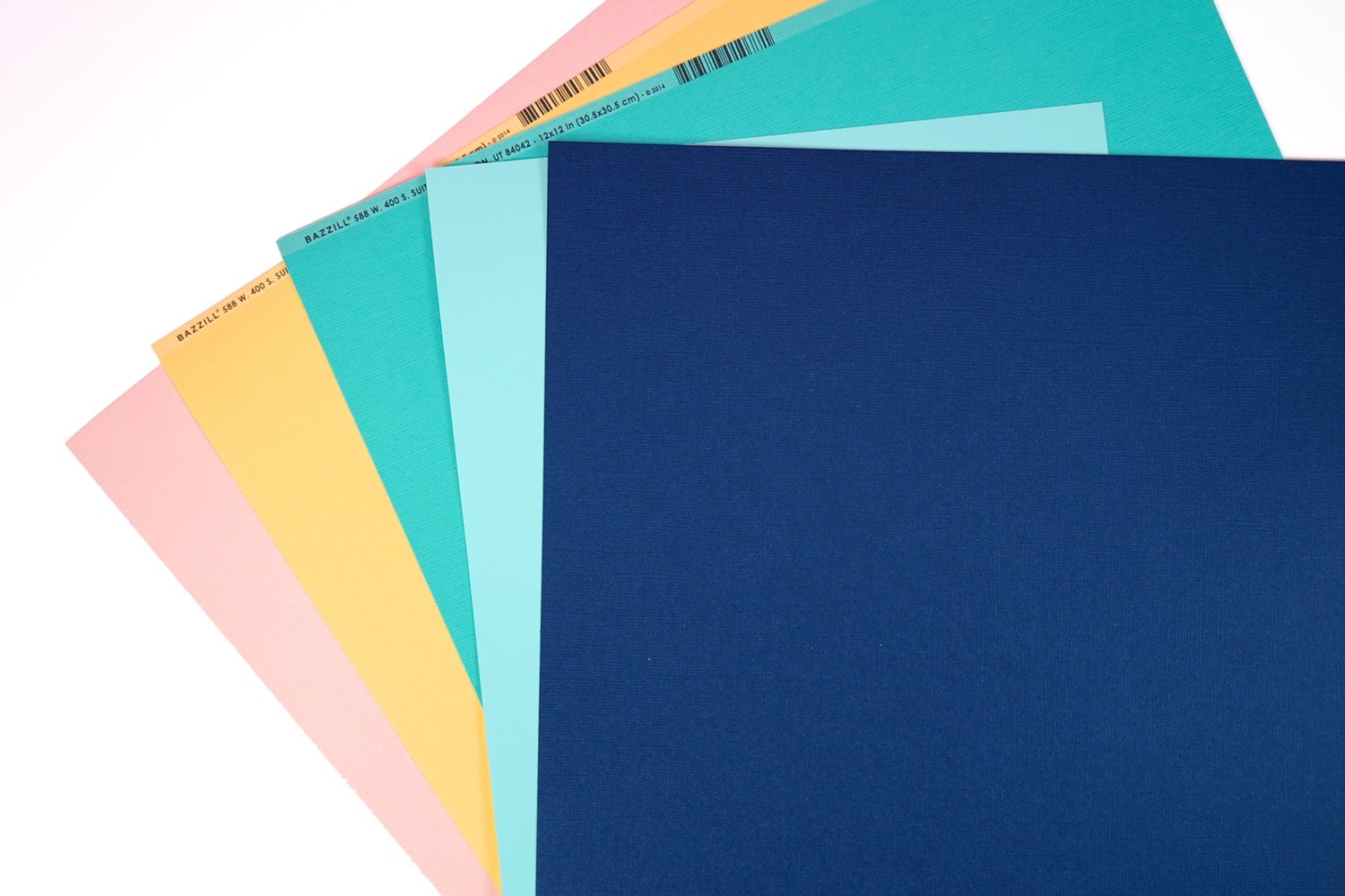 Colorful sheets of cardstock on a white background
