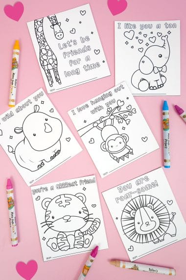 Printable Valentine's Day cards with jungle animals on light pink background with hearts and crayons