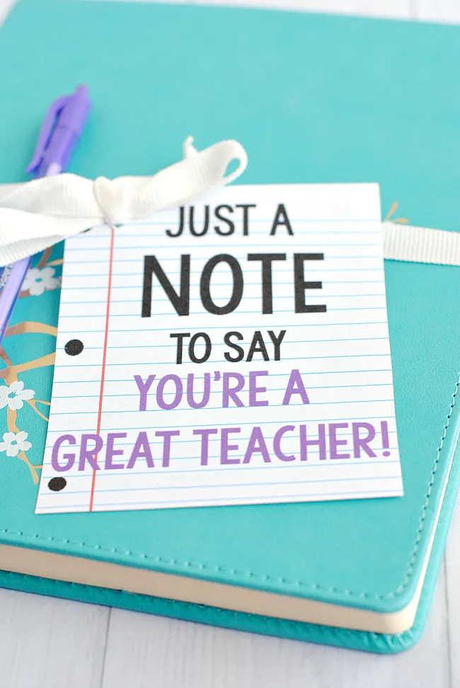 just a note to say youre a great teacher on binder paper gift tag tied to stationary gift