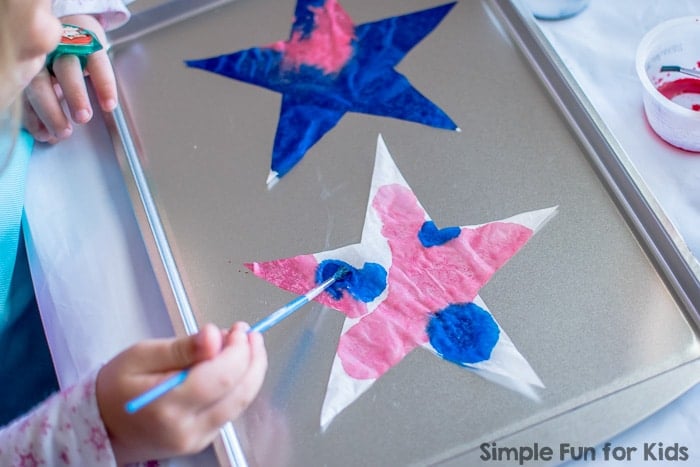 Blue and red dyed coffee filters cut into a star shape.