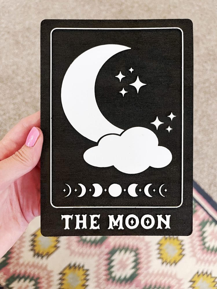 hand holding moon tarot card svg file engraved on card