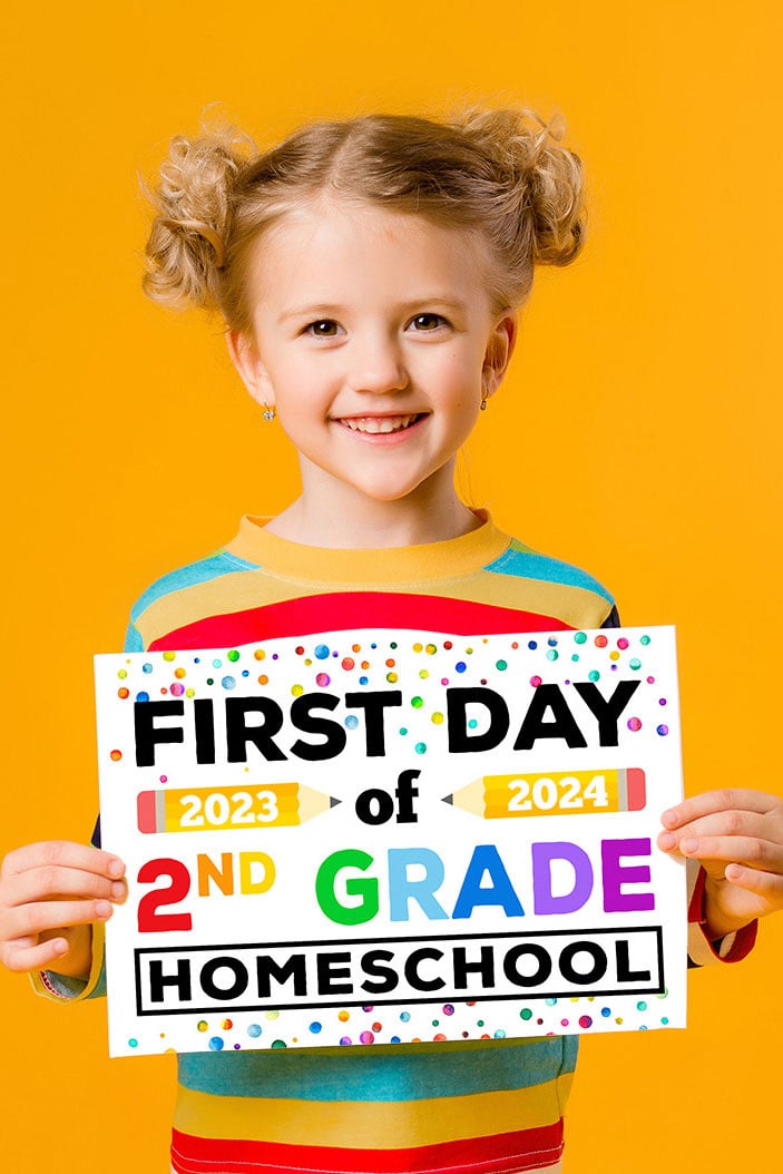 Cute blonde white girl holding printable first day of school sign on orange background