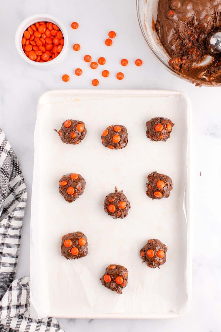 Halloween Cake Mix Cookie dough balls on a white tray.