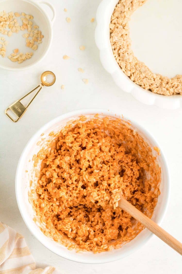 Mixing Rice Krispie Treat Ingredients in Bowl on White Tabletop