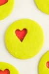 Single round Christmas cookie with red candy heart