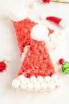 Close up of Santa hat treats on festive background