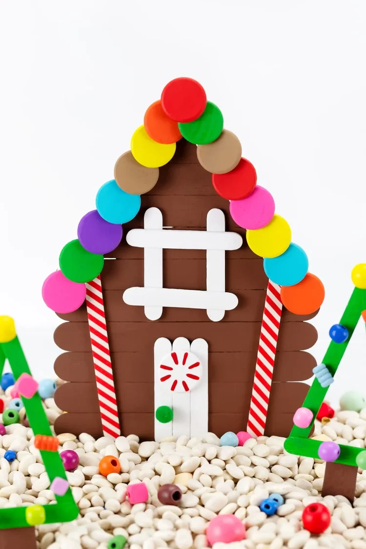craft sticks made into a gingerbread style house