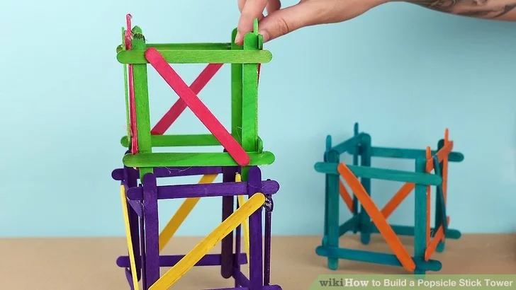 craft sticks made into a wooden stackable tower