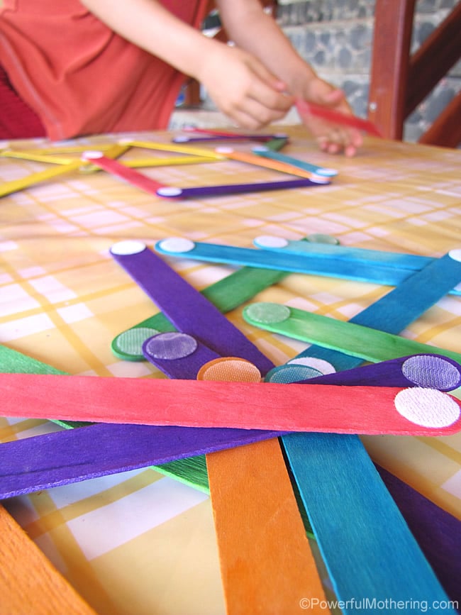 craft sticks with glued on velcro dots to make a game 