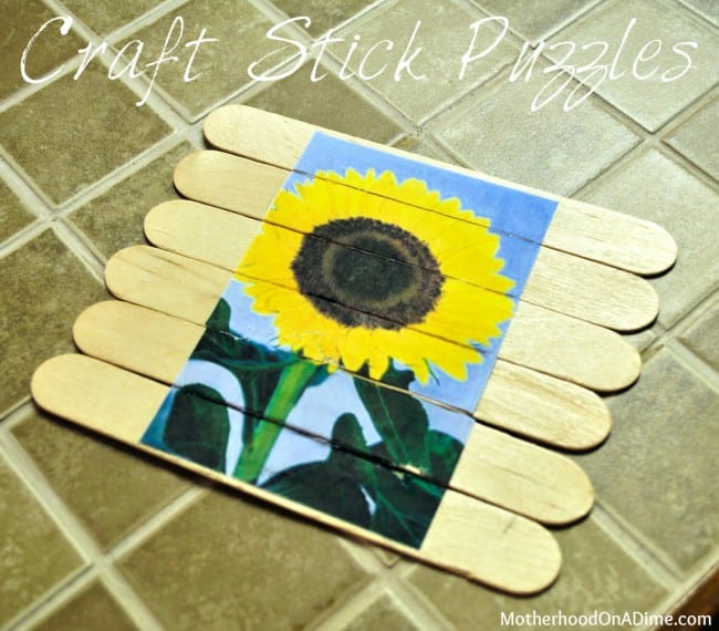 craft sticks made into a wooden puzzle with a printed photo of a sunflower
