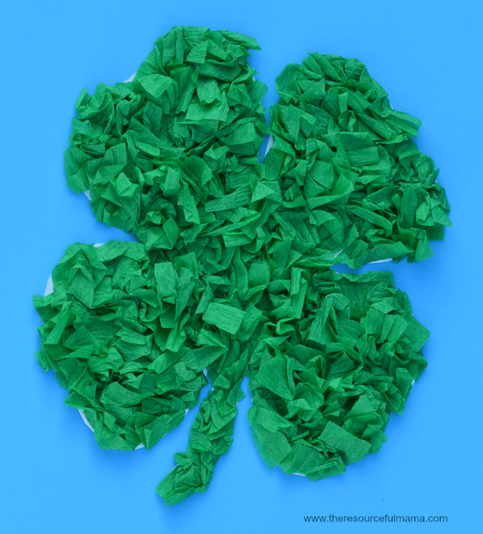 a pile of green tissue paper made into shamrock