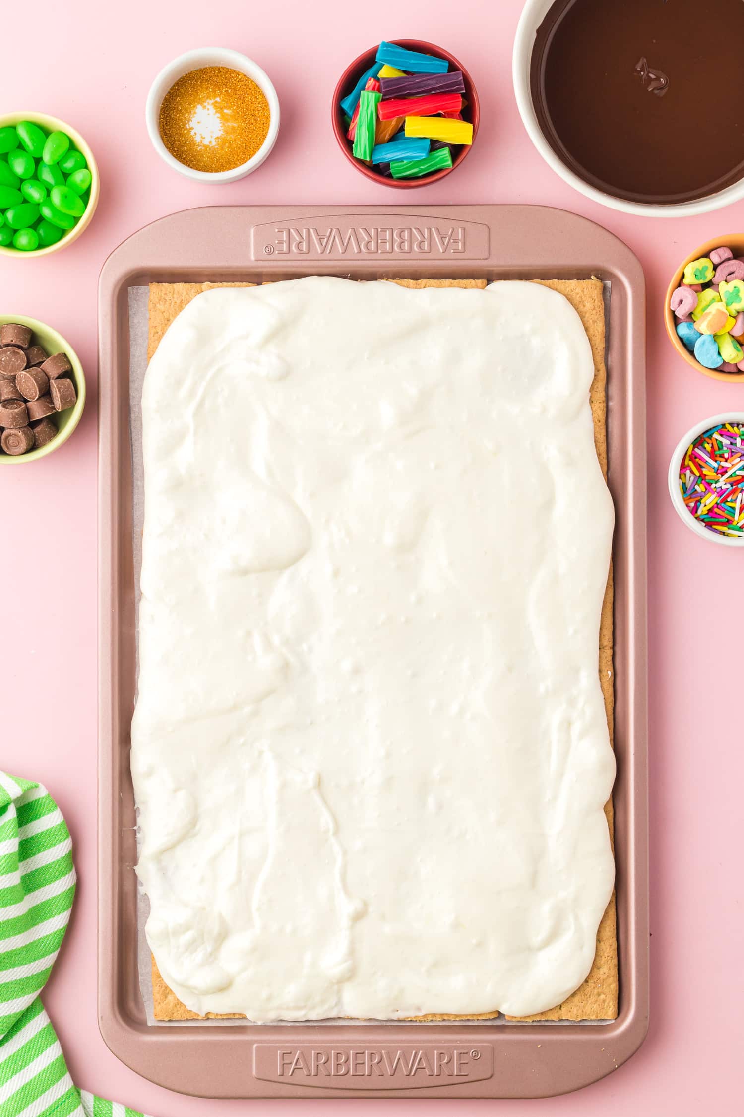 Marshmallow spread onto graham crackers in pan