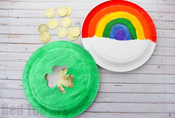 rainbow colored onto paper plate and shamrock stamped into another paper plate and colored green with gold coin background