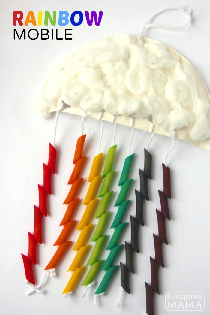 rainbow made from colored pasta noodles strung to a cotton ball cloud