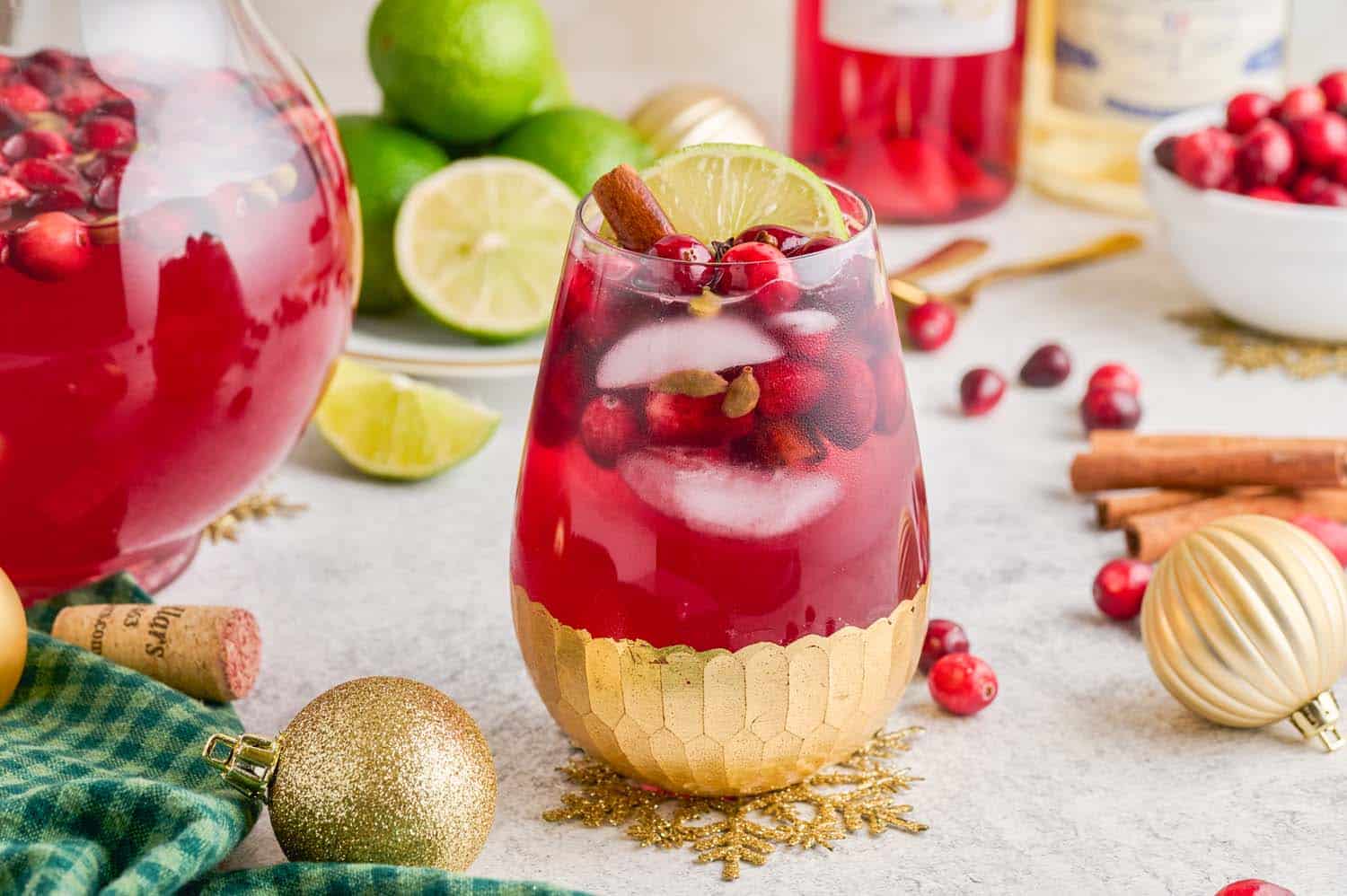 Gold leaf bottomed wine glass with Spiced Cranberry Wine Spritzer