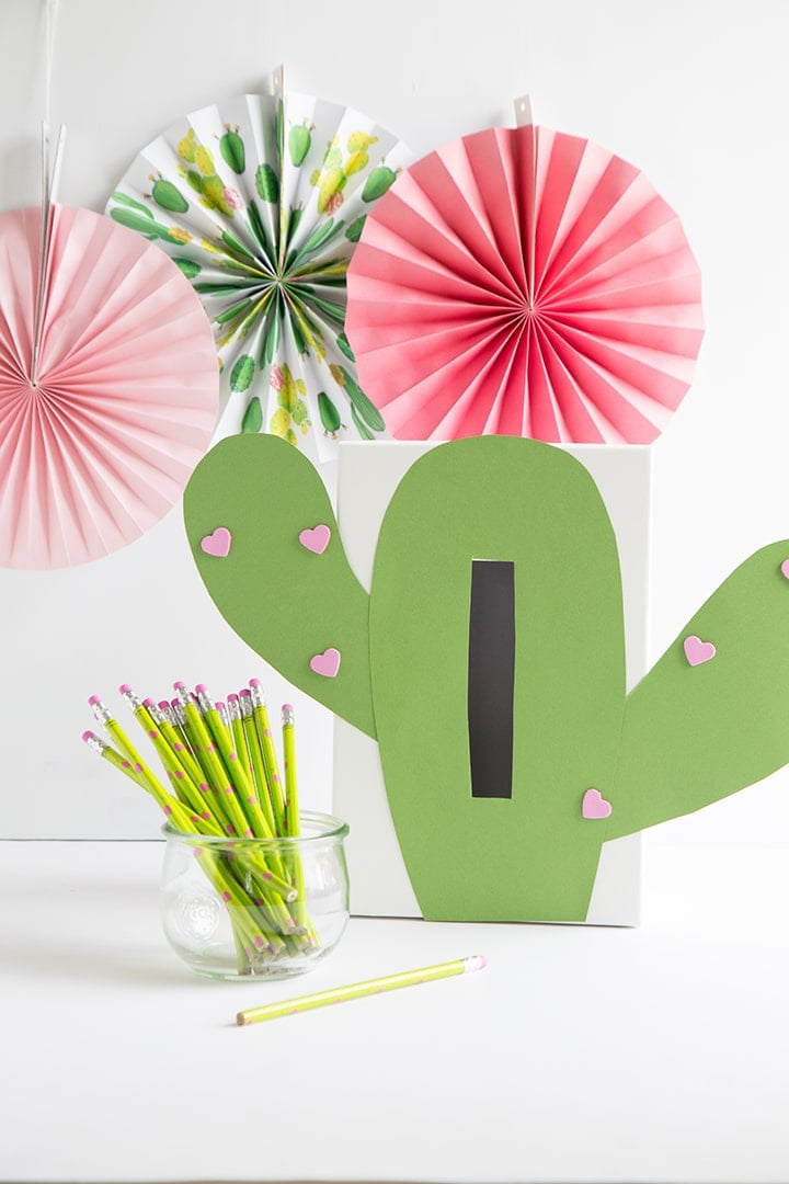 cactus valentine card box with paper pinwheels and neon cactus pencils