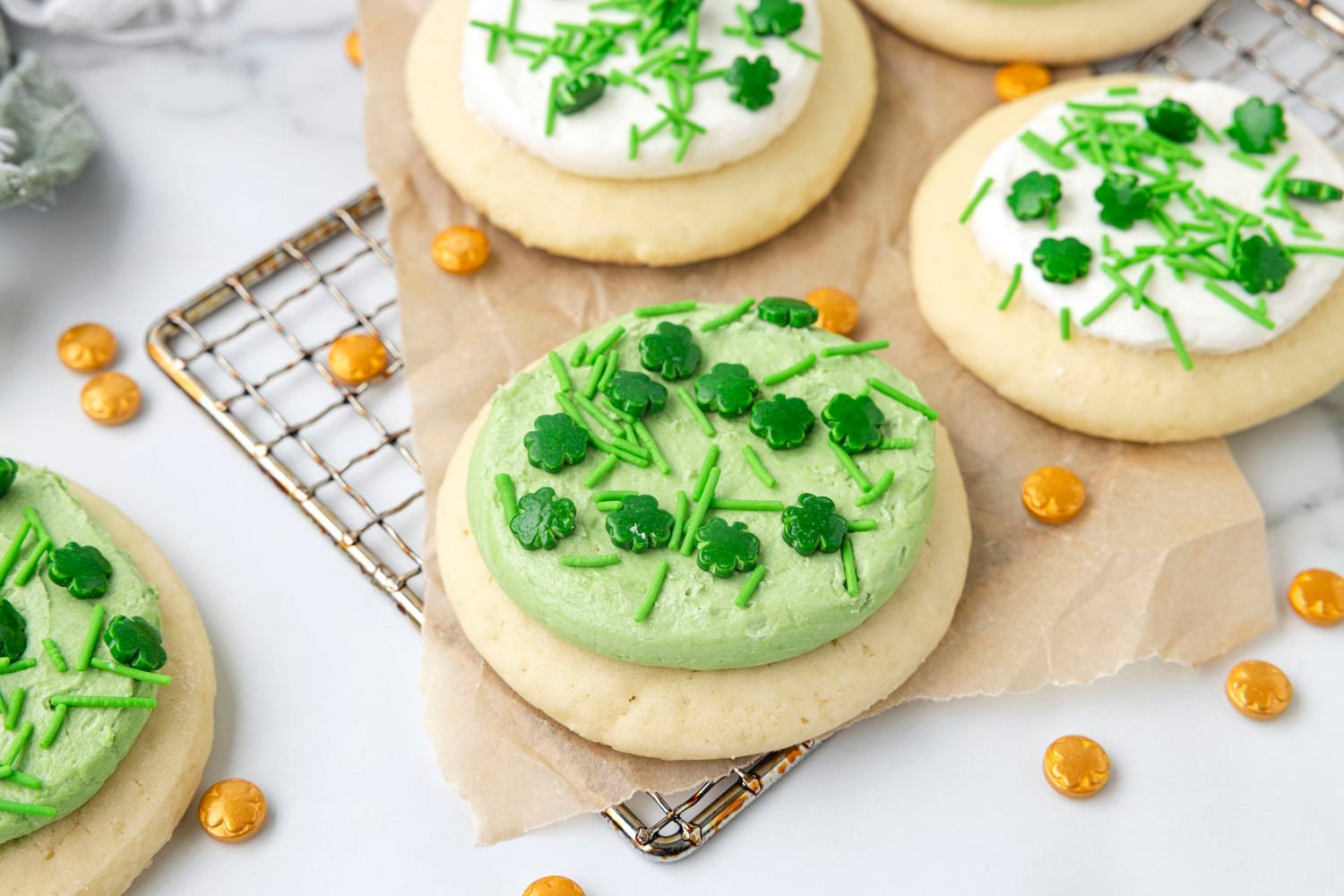 Green St Patrick's Day sugar cookies on rack